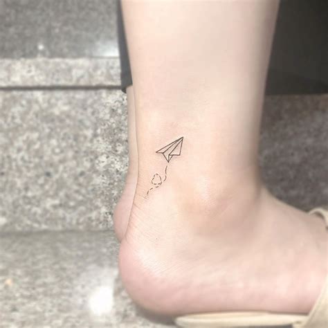 tiny airplane on your ankle - filler tattoo ideas